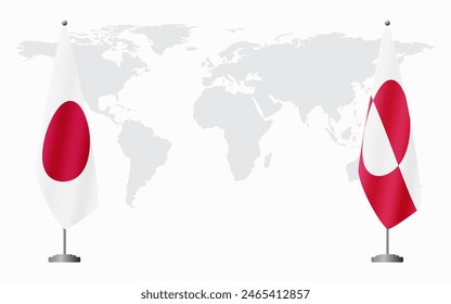 Japan and Greenland flags for official meeting against background of world map.