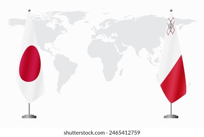 Japan and Malta flags for official meeting against background of world map.