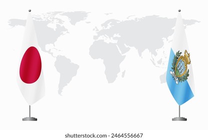 Japan and San Marino flags for official meeting against background of world map.