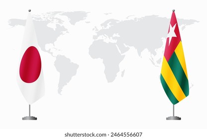 Japan and Togo flags for official meeting against background of world map.
