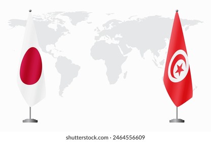 Japan and Tunisia flags for official meeting against background of world map.