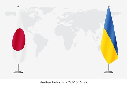 Japan and Ukraine flags for official meeting against background of world map.