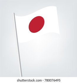 Japan vector flag template. Waving flag of japan on a metallic pole, isolated on a white background,Japan vector table flag template. Waving Japanese flag on a metallic pole.
