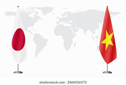 Japan and Vietnam flags for official meeting against background of world map.