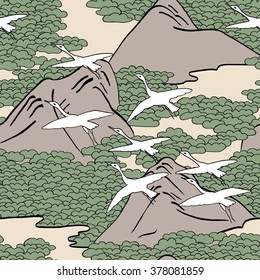 Japanese art inspired seamless pattern of gliding birds over mountains