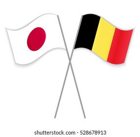 Japanese and Belgian crossed flags. Japan combined with Belgium isolated on white. Language learning, international business or travel concept.