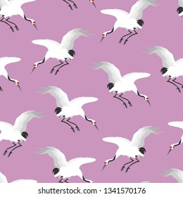 Japanese crane seamless, illustrated pattern. 80's inspired neon colored birds in flight for gift wraps, fabrics, wall-hangings, stationery and interior design. 