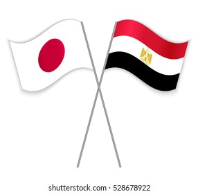Japanese and Egyptian crossed flags. Japan combined with Egypt isolated on white. Language learning, international business or travel concept.