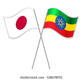 Japanese and Ethiopian crossed flags. Japan combined with Ethiopia isolated on white. Language learning, international business or travel concept.