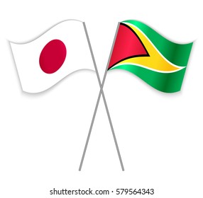 Japanese and Guyanese crossed flags. Japan combined with Guyana isolated on white. Language learning, international business or travel concept.