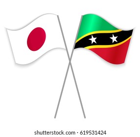 Japanese and Kittitian crossed flags. Japan combined with Saint Kitts and Nevis isolated on white. Language learning, international business or travel concept.