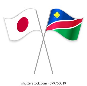 Japanese and Namibian crossed flags. Japan combined with Namibia isolated on white. Language learning, international business or travel concept.