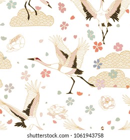 Japanese pattern. Seamless vector ornament with traditional motives. Japanese pattern with storks and sakura.