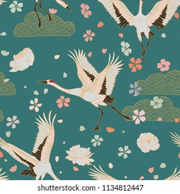 Japanese pattern. Seamless vector ornament with traditional motives. Japanese pattern with storks and sakura.