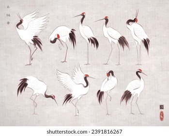 Pájaros de grúas coronados de rojo japonés de estilo oriental sobre fondo de papel de arroz. Pintura tradicional japonesa de tintas sumi-e. Jeroglíficos - eternidad, libertad, felicidad, zen.