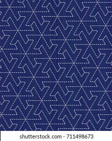 Japanese sashiko motif with stylized flowers. Seamless pattern. Traditional Japanese Embroidery Ornament. Abstract backdrop. For decoration or printing on fabric. Indigo background.