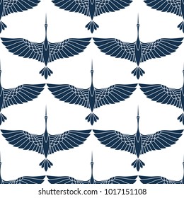 Japanese seamless pattern with beautiful cranes. Chinese vector background with flying birds. Ornament with oriental motives.