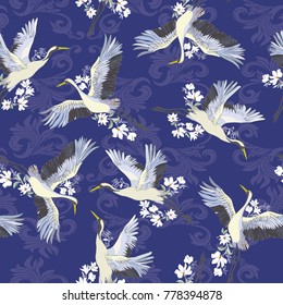 Japanese seamless pattern of birds and water. Traditional vintage fabric print. White and blue indigo background. Kimono design. Monochrome vector illustration.