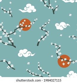Japanese seamless pattern with  flowering oriental cherry and decorative clouds on blue background. Seamless vector ornaments with Chinese traditional motives.