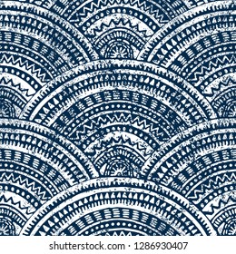 Japanese seigaiha wave pattern. Ethnic print for textiles. Aztec and tribal motifs. Wavy wallpaper drawn by hand. Vector illustration.