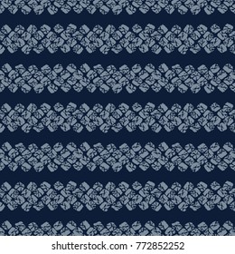 Japanese Shibori ornament. Asian seamless pattern. Horizontal motif. Dark indigo background. Classic japanese dyeing technique. Plain backdrop for decoration, wallpaper or handiwork.