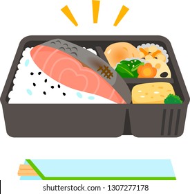 Japanese style bento box with grilled salmon