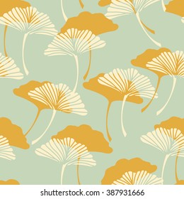 a  japanese style ginkgo biloba leaves seamless tile in a gold and light blue color palette