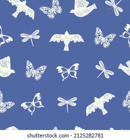 Japanese style seamless pattern of birds, butterflies and dragonflies on a blue background. Stylish vector illustration. 