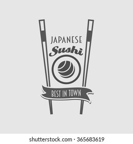 japanese sushi logo or label concept with two chopsticks and roll