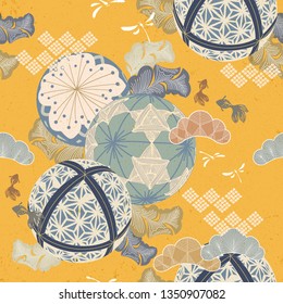 Japanese temari ball pattern vector. Yellow background with cherry blossom floer, dragonfly, gold fish leaves and pine tree ornaments kimono textile.