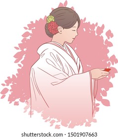 Japanese traditional shrine wedding. A nuptial cup (exchange cups of sake at wedding)