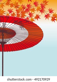 Japanese umbrella and autumn leaves