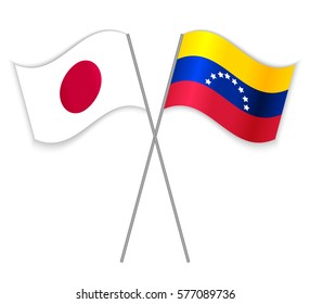 Japanese and Venezuelan crossed flags. Japan combined with Venezuela isolated on white. Language learning, international business or travel concept.