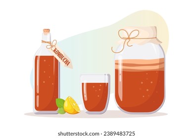 Jar, vidrio y botella de té kombucha casero, limón, hojas de menta. Inscripción Kombucha. Bebida refrescante con fruta. Seta de té probiótica fermentada. Comer sano 