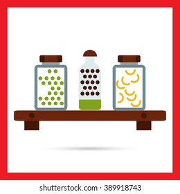 Jars with peas and pasta on shelf