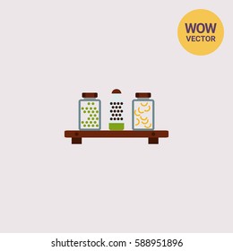 Jars with peas and pasta on shelf