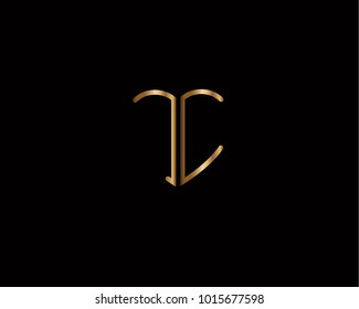 JC initial heart shape gold colored logo