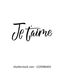 Je t'aime - I love you in french- modern brush calligraphy. Isolated on white background.