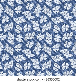Jeans background with flowers.