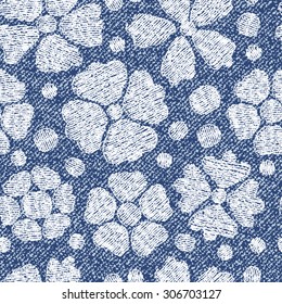 Jeans background with flowers. Vector Denim seamless pattern. Blue jeans fabric.