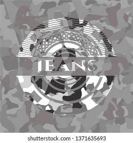 Jeans on grey camo texture