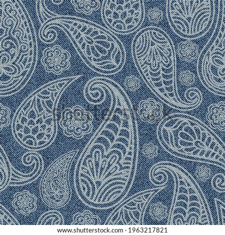 Jeans seamless pattern with Indian paisley ornament. Turkish cucumber on blue Denim texture background. Vector illustration