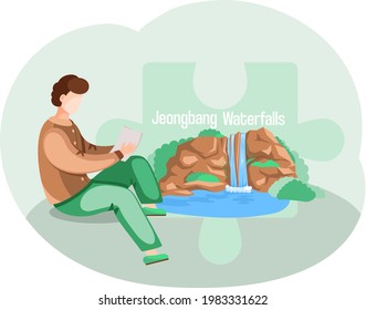 Jeongbang Waterfalls famous landmark of Jeju Island in south Korea. Popular place for visiting male traveler sitting on big stone, jeju green tropical island with water travel. Traditional showplace