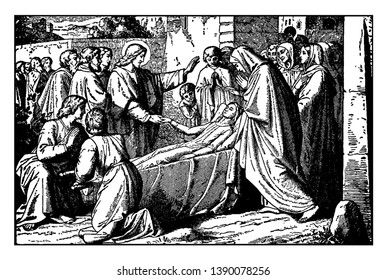 Jesus is giving blessings to a young sick boy and trying to heal him. Boy's mother and other people are standing around them, vintage line drawing or engraving illustration.
