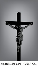 Jesus on the Cross.Jesus on a cross isolated on a dark gray  background.