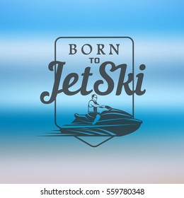 jet ski born to on blurred background