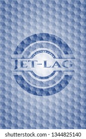 Jet-lag blue badge with geometric background.