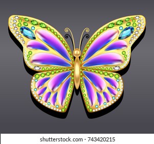 Jewelry gold butterfly in gems. Beautiful decoration. Isolated object.