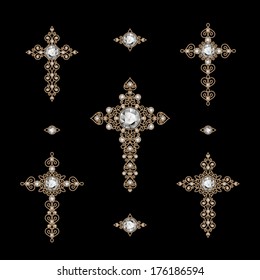 Jewelry set of antique gold Christian Crosses decorated with diamonds, isolated on black, vector eps10