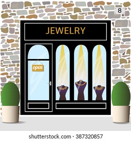 Jewelry shop. Building facade of stone. Dummies with golden   necklaces in the shop window.Vector illustration eps 10.